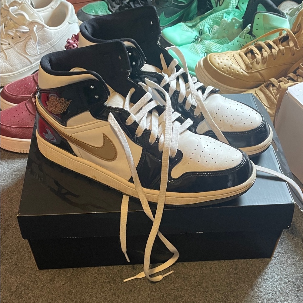 Nike Black, White, and Gold High-Top Sneakers